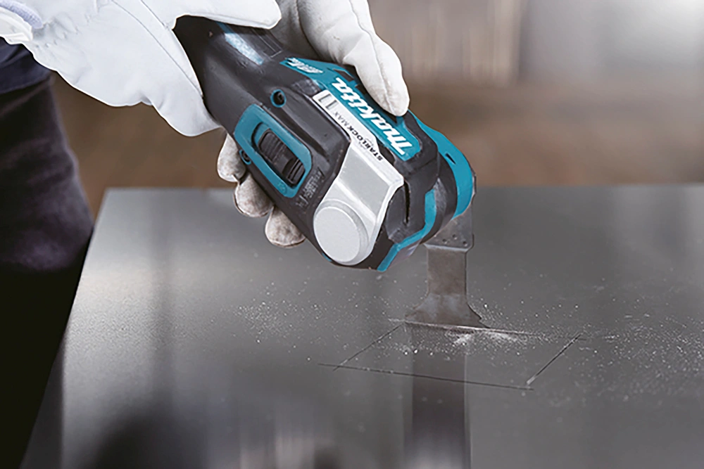 Многофункциональный инструмент Makita DTM52RTJX1